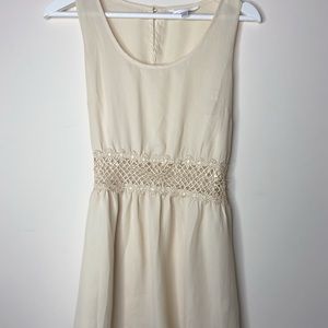 Sheer cream colored flirty dress pattern cut out